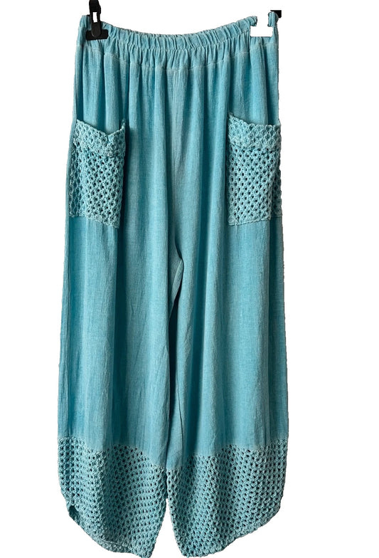 Women's turquoise trousers with pockets