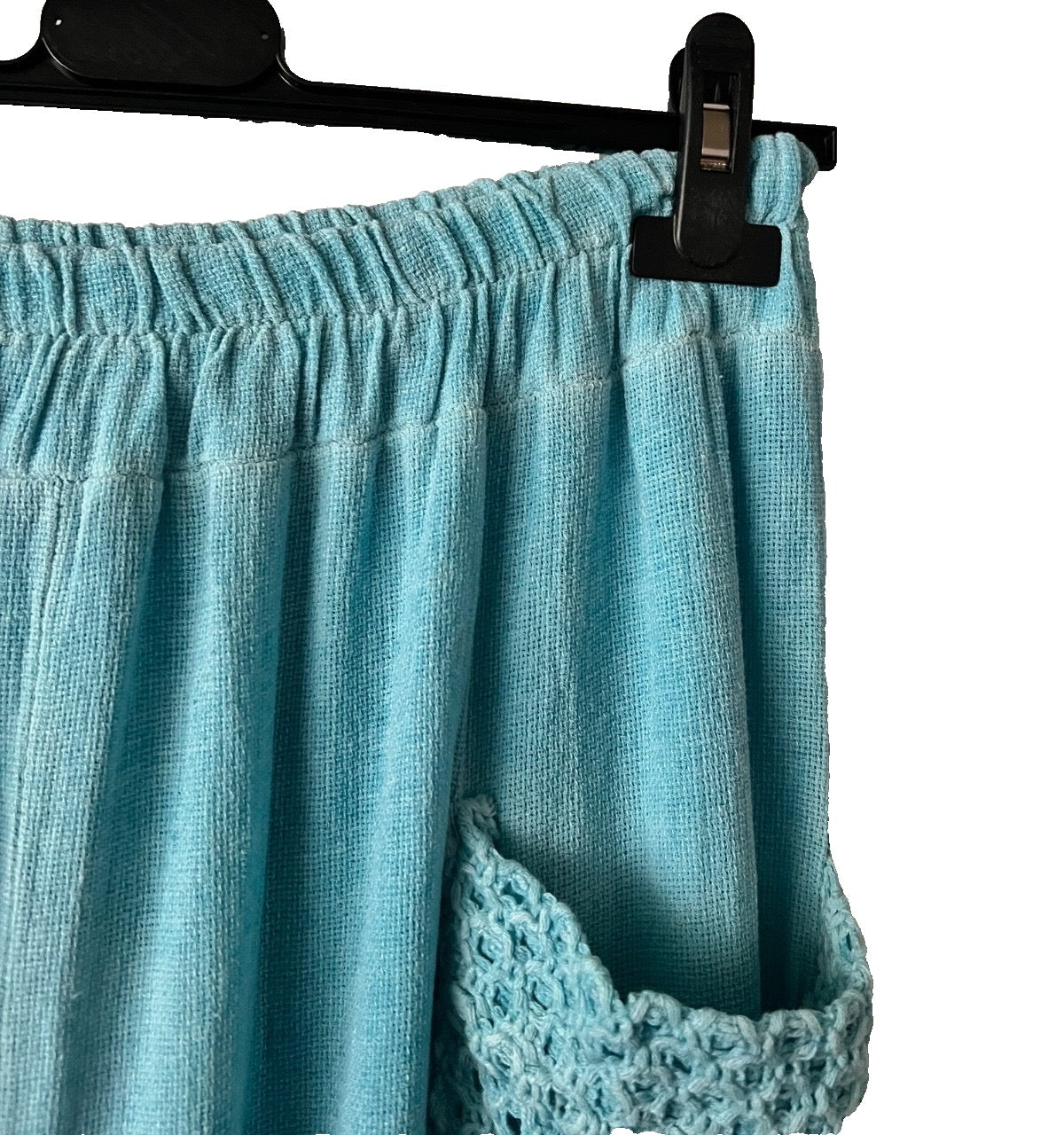 Women's turquoise trousers with pockets